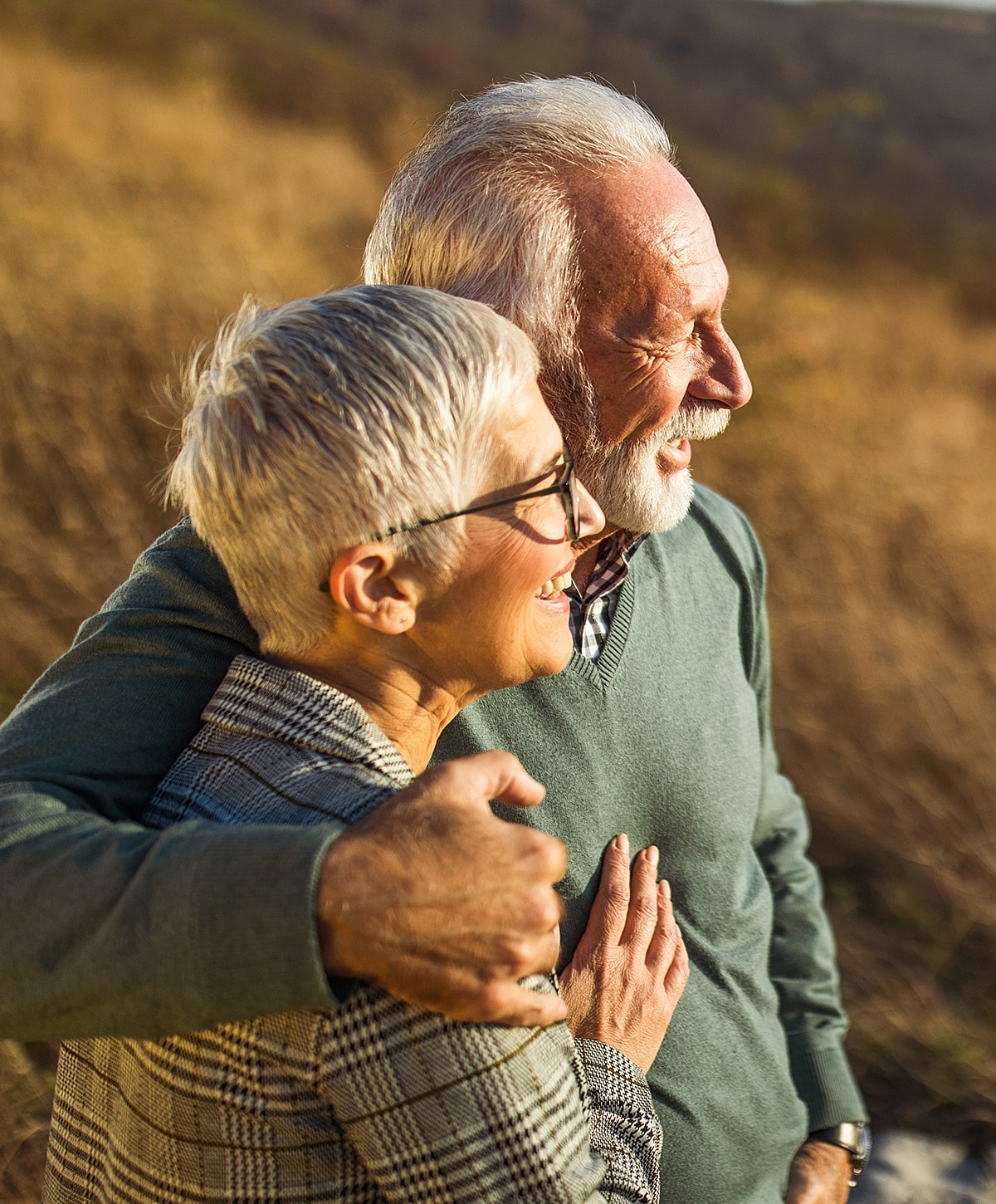 Happy couple enjoying a moment outdoors.