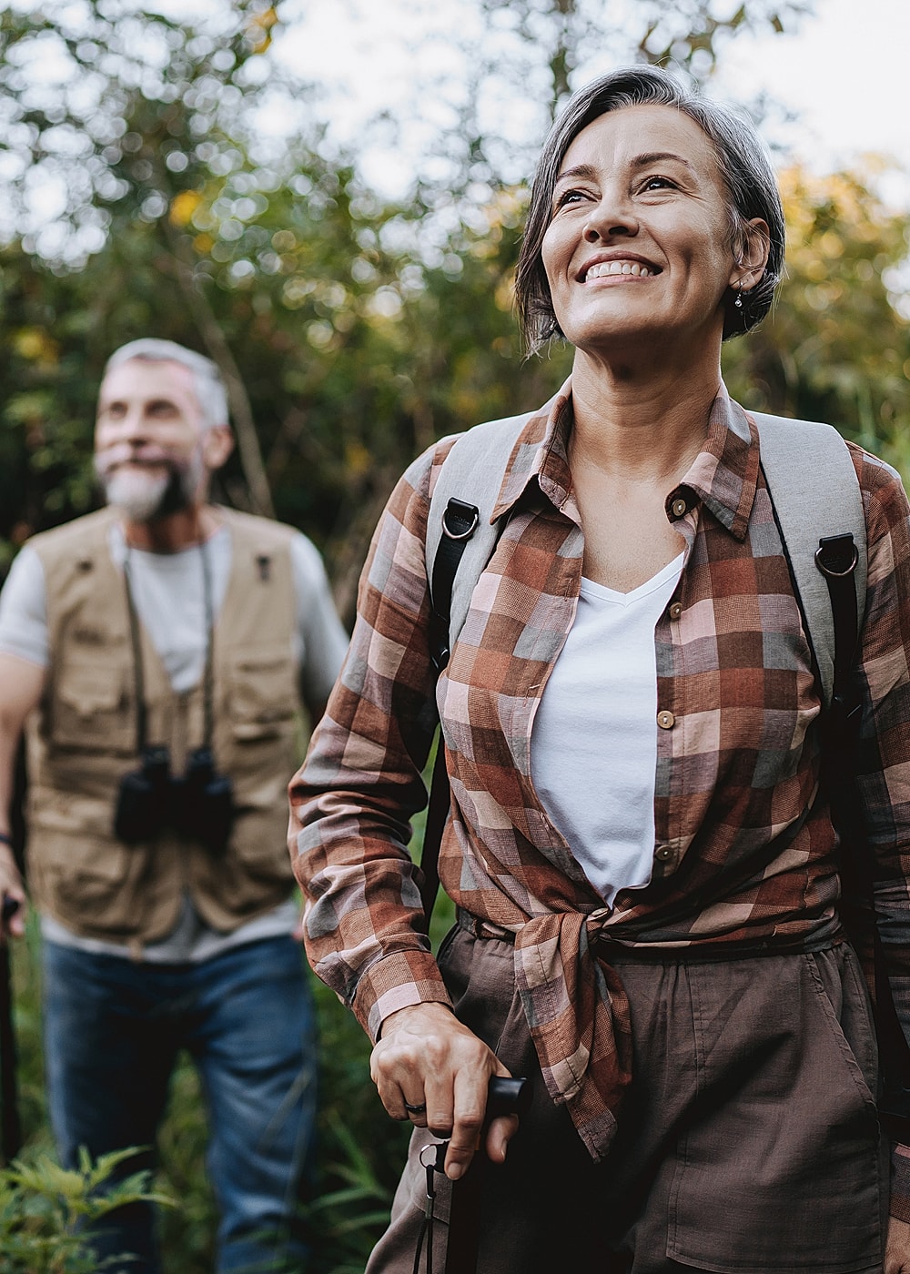 Happy hikers enjoying nature together outdoors.